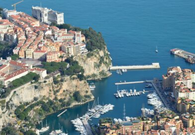 Breathtaking aerial view of Monaco's coastline, featuring the picturesque marina and historic architecture.