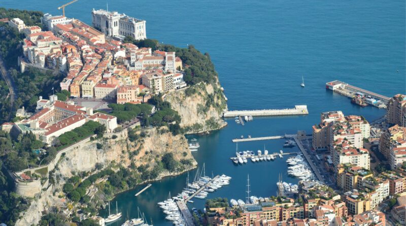 Breathtaking aerial view of Monaco's coastline, featuring the picturesque marina and historic architecture.